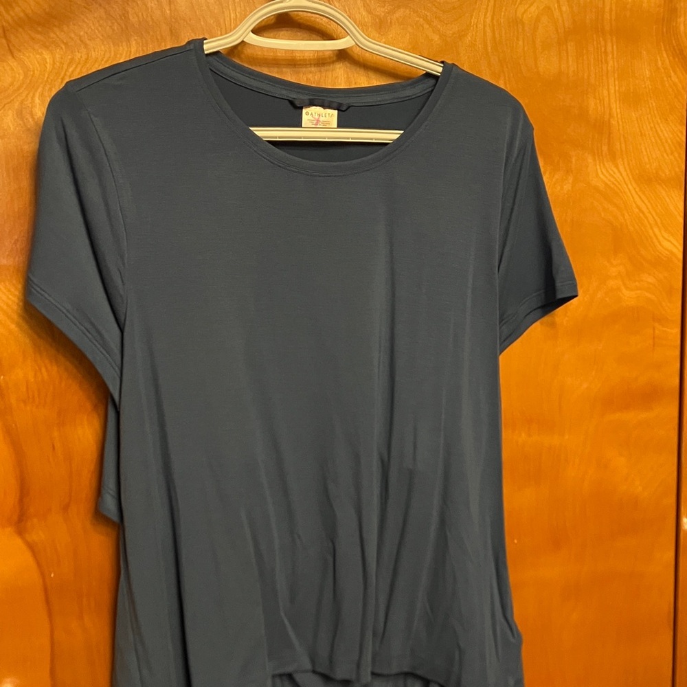 ATHLETA. BLUE AIR OUT CINCH TEE. SIZE LARGE. SHORT SLEEVE. ANTI-ODOR. BRAND NEW